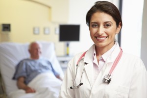 Image of a doctor with a patient In the background.