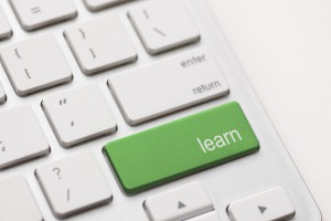Image of a keyboard with the word 'learn' highlighted in green.
